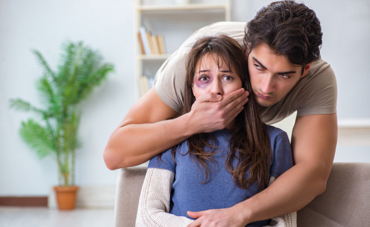 Man covering mouth