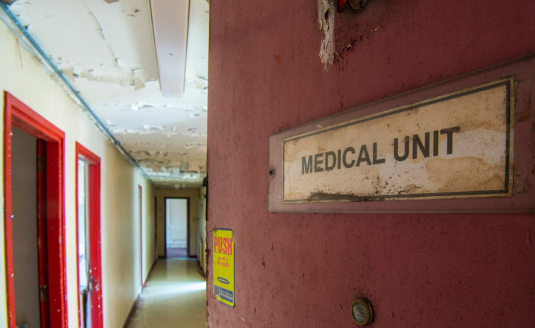 Door with medical unit sign