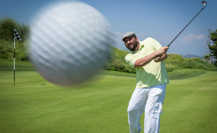 golfer hitting ball