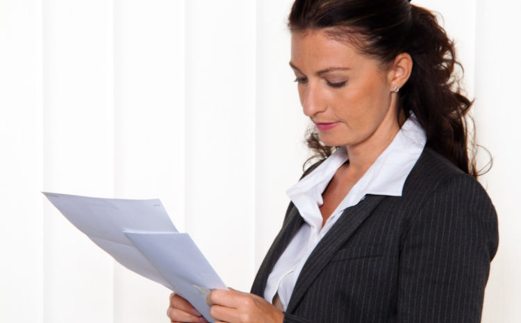 Woman reading papers