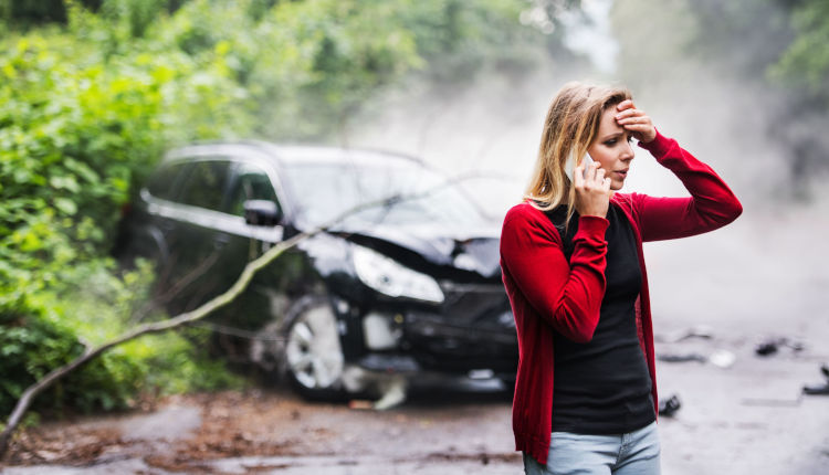 Woman on Phone with car crash