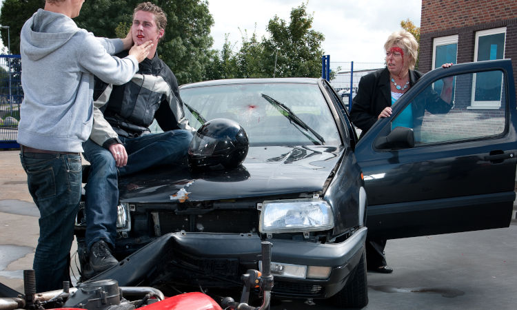 Man hits car with Motorcycle