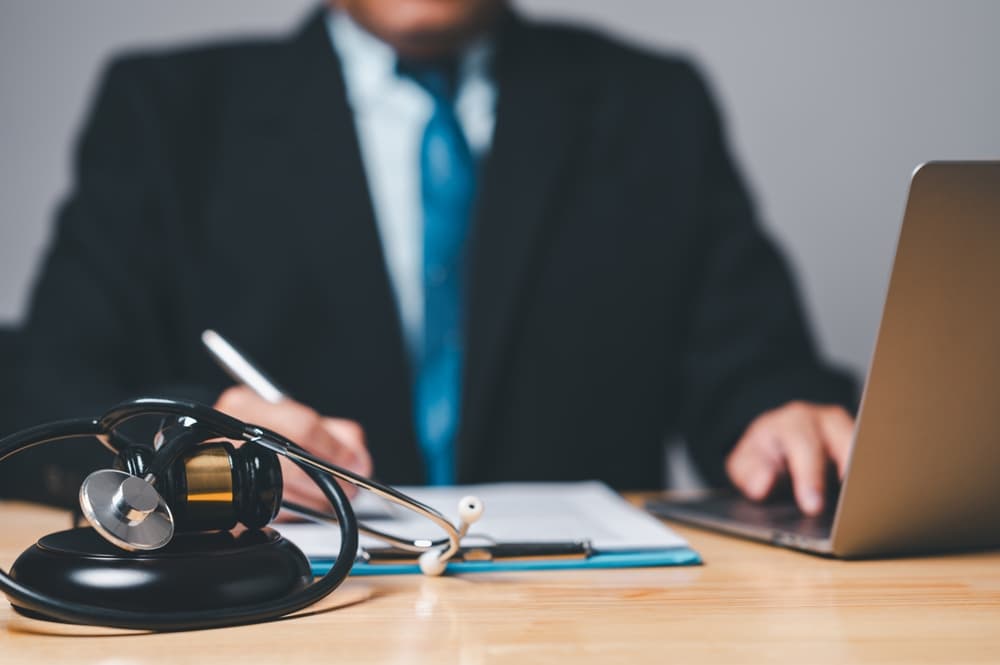 Crown Point, Indiana, personal injury lawyer A personal injury attorney, empowered by legal expertise, guides clients to a fair resolution, holding the symbolic gavel of justice.