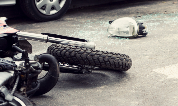 Motorcycle on street after accident